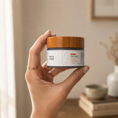 MERAKKEE Purifying Charcoal Facial Mask 50g — glass jar held in hand size reference — Revitaliz Purity India