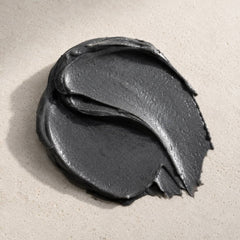 MERAKKEE Purifying Charcoal Facial Mask — deep black mask texture swatch on white — Charcoal Neem Tea Tree formula